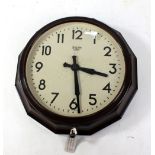 A 1940s Smiths Sectric brown bakelite electric wall clock with dodecagonal case, width 40cm.