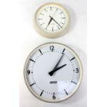 A Gents' of Leicester electric circular wall clock, diameter 49cm,