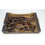 A group of various tools to include clamps, cranks, a set square, manual drills, etc.