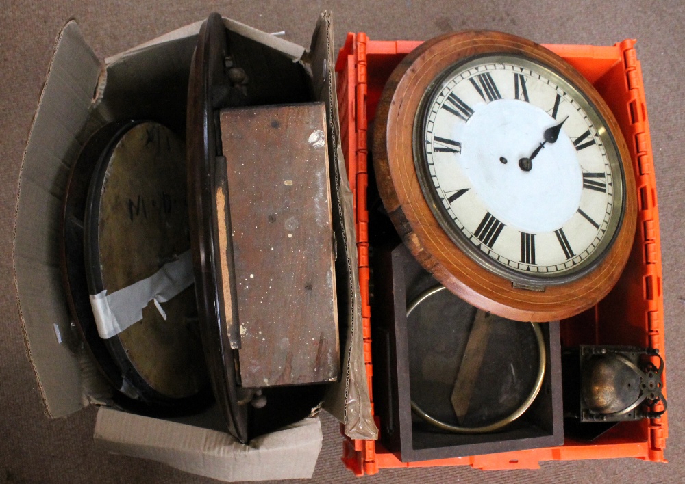 A quantity of clock parts including wall clock case, brass bezels, frames, lantern clock, etc.