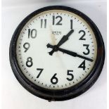 An industrial black painted metal framed Smiths setric wall clock, diameter 60cm (af).