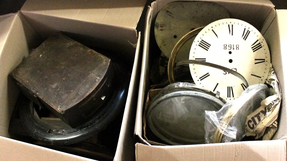 A quantity of clock parts, including circular wall clock dials, bezels, dials, etc.