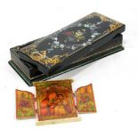 A Victorian papier-mâché mother of pearl inlaid and gilt heightened glove box with floral and