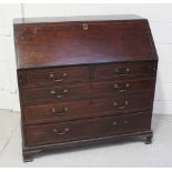 A George III mahogany line inlaid bureau with architectural fitted interior to include two pilaster