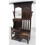 An oak Arts and Crafts hall stand,