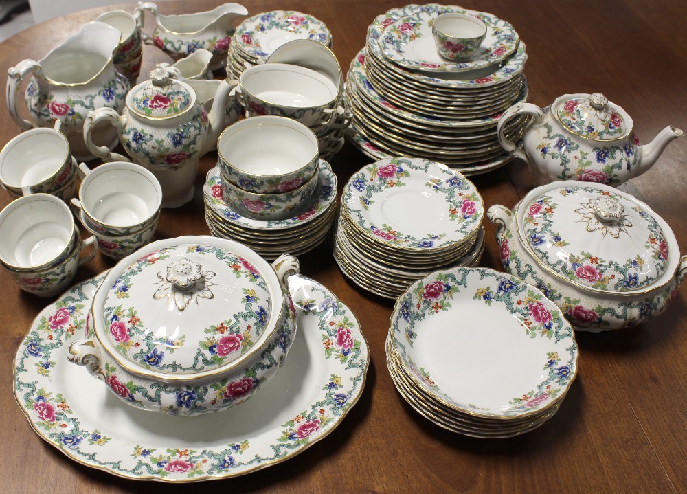 A large quantity of Booths 'Flora Dora' pattern dinner and teaware comprising dinner plates,