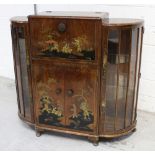 An early 20th century mahogany Art Deco cocktail cabinet with pull down front to mirrored interior