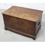 An early 20th century oak blanket box of dovetail construction,