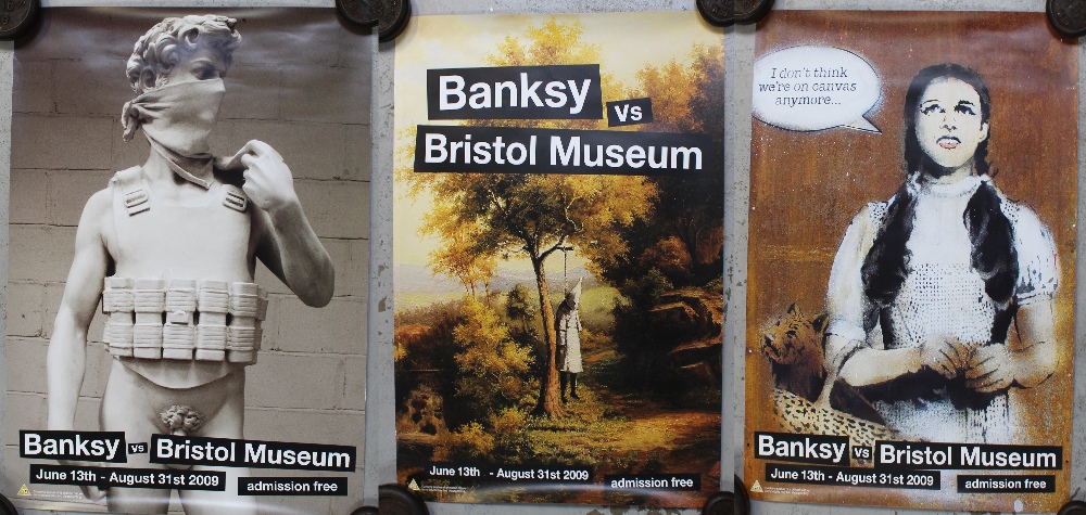 Four original Banksy posters from the Banksy exhibition 'Banksy vs Bristol Museum' dated June