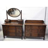 An early-to-mid 20th century part bedroom suite comprising an oak three-drawer dressing chest with