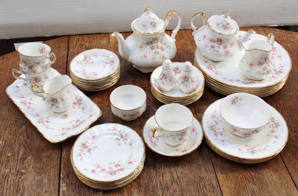 A Paragon Victoriana Rose' pattern part dinner and tea service comprising teapot, and small teapot,