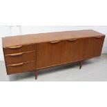 A 1960s Scandinavian style teak sideboard with bank of three drawers to left hand side,