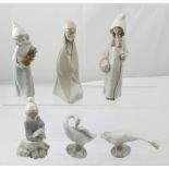 Six Lladró figurines to include two geese, child holding a hen, a little boy with lamb,