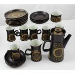 A 1970s Denby 'Arabesque' pattern coffee service comprising coffee pot, milk jug, sugar bowl,