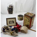 A mixed lot to include vintage tin containing oil lamp parts, a collection of buttons, flags,