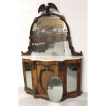 A Victorian walnut mirror back marble topped chiffonier with carved eagle and foliate scroll