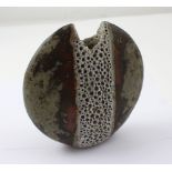 Alan Wallwork; an ovoid vase of abstract form, brown ground with central abstract pebble design,