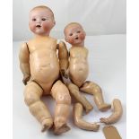 Two early 20th century Armand Marseille bisque head baby dolls with composite bodies;