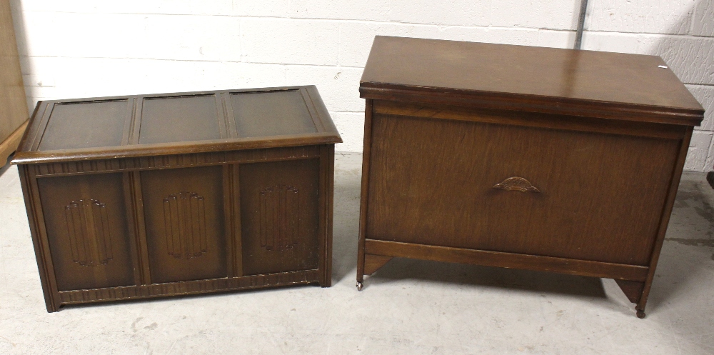 A modern oak blanket box of plywood and beech construction with replica linen-fold panels to the