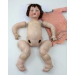 An Otto Gans for Armand Marseille bisque head doll with composite body,