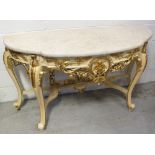 A contemporary ornate console table in the French style with composite marble top,