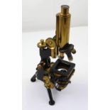A W Watson & Sons Ltd lacquered brass and ebonised three-lens mahogany cased microscope, serial no.