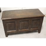 A late 18th century oak three panel coffer raised on style supports, width 97cm.