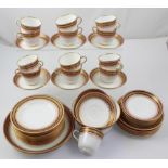 A Mintons 19th century part tea service comprising twelve cups, sixteen saucers,