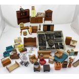 A large collection of dolls' house furniture, mostly scratch-built from plywood,