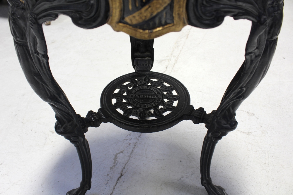 A cast iron Britannia table by T J Griffiths of Liverpool, with a later top, diameter 61cm. - Image 2 of 2