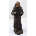 A Teutonic monk figure with tonsure and dressed in cowl by Goldschieder, marked to the base,