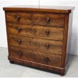 A Victorian mahogany chest of two short over three long drawers raised on bun feet, width 122cm.