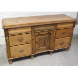 A good 19th century stripped pine sideboard,