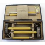 A cased set of fitments for Overbecks Rejuvenator in black Moroccan leather box, width 28cm,