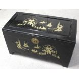 A Chinese brass inlaid camphorwood bedding box with hinged lid, width 90cm.