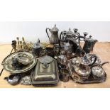 A mixed lot of plated items to include a four piece tea service, a candelabrum, trophies etc,