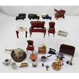 A collection of dolls' house furniture to include settee, chairs, dressing table,