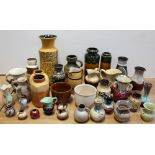 A collection of predominantly West German pottery to include a large yellow ground vase,