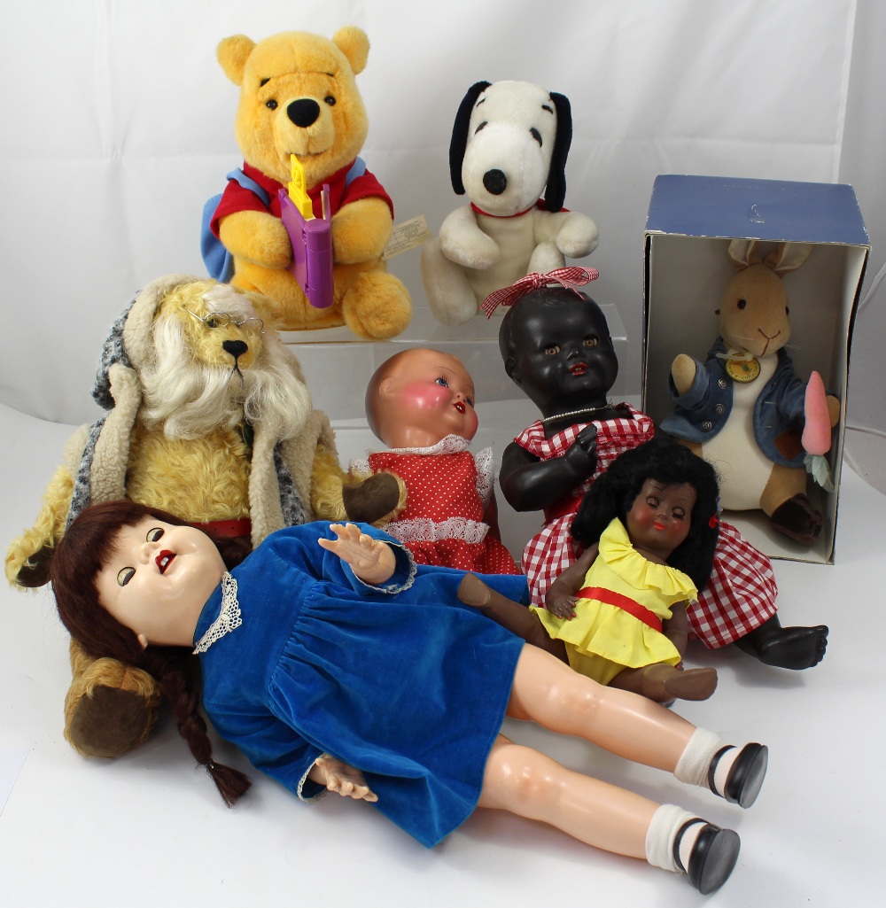 A small collection of dolls and teddy bears to include a Frederick Warn Peter Rabbit limited