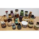 A collection of predominantly West German pottery to include a mottled brown baluster vase,