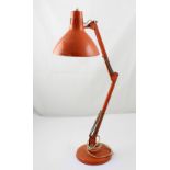 A retro Anglepoise-style lamp.