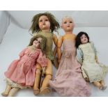 A group of German dolls to include example by HW marked 61/2 to the back of the neck,