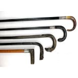 Three horn handled walking sticks to include a malacca shafted hallmarked silver mounted example