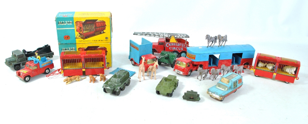 A group of Corgi Chipperfield's Circus models with two boxed animal cages and loose examples