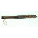 A William IV turned wooden truncheon with painted WR beneath crown cipher, length 41cm.