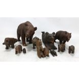A group of early 20th century Black Forest carved bears, including standing and lying examples,