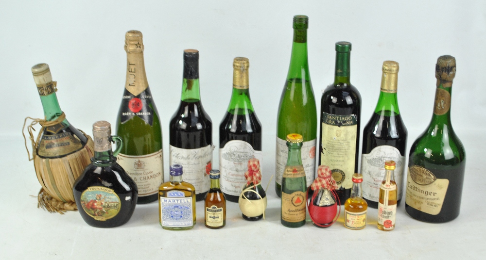 A mixed group of wines and spirits including Moet & Chandon Premiere Cuvee Champagne,