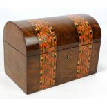 A Victorian walnut and inlaid tea caddy with domed hinged lid, width 23cm, lacking key.