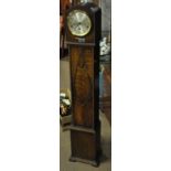An early 20th century oak eight day grandmother clock,