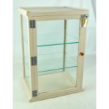 A glazed table top two shelf display cabinet, 56cm.